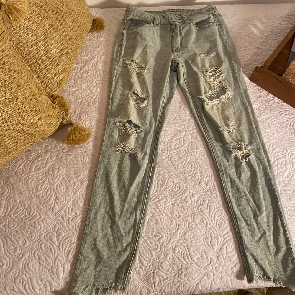 Distressed light wash jeans